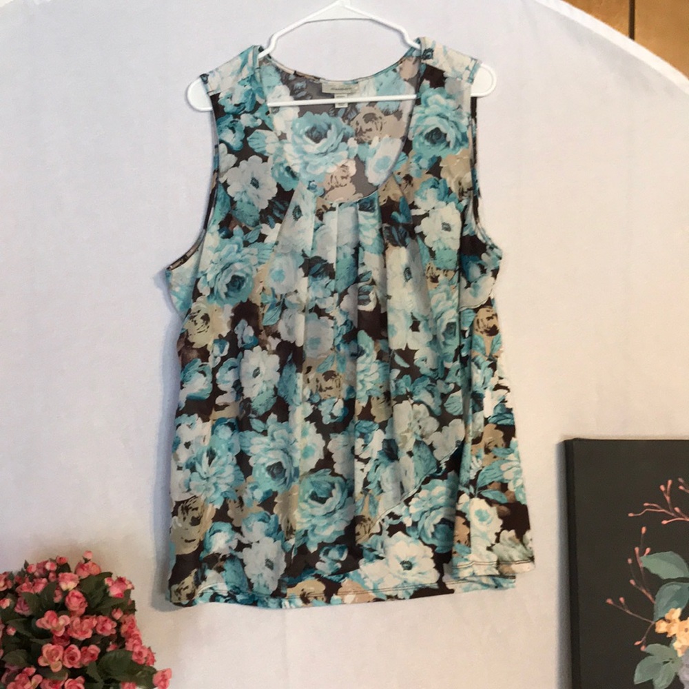 Sleeveless Blouse with Sheer Overlay.